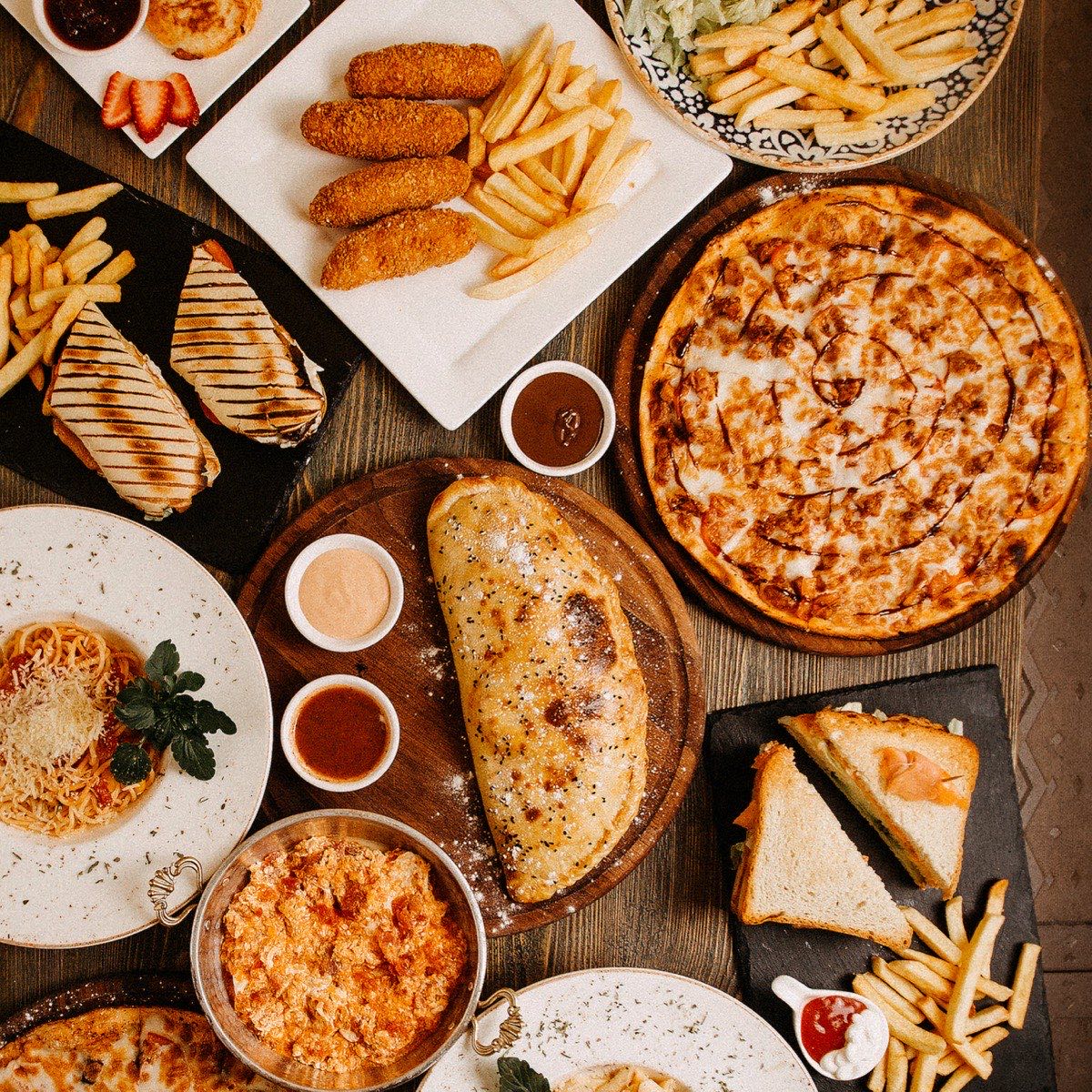 Cafe table with variety of food and drinks