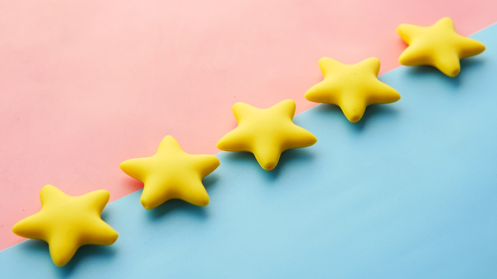 Five yellow stars in a row, illustrating a Google star rating
