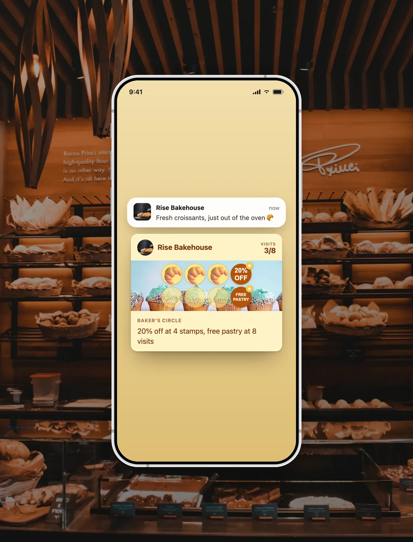 Rise Bakehouse loyalty card in the wallet with a lock-screen customer message from the business.